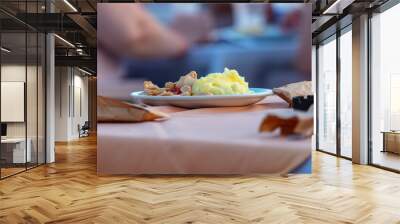 Meat with potatoes and vegetables in a plate Wall mural