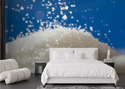 sugar on a blue background Wall mural