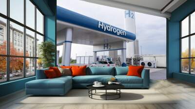 Fuel cell car at the hydrogen filling station. Concept Wall mural