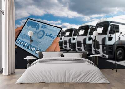 Manager with a digital tablet on the background of semi trucks. Fleet management	
 Wall mural