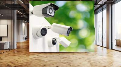 Surveillance cameras  on a green background. Perimeter security	 Wall mural