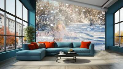 woman throws snow up Wall mural