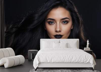 Stylish and bold close-up portrait of a woman with flowing dark hair and dramatic black lipstick. Captures elegance and confidence against a dark background, highlighting fashion and beauty concepts.
 Wall mural