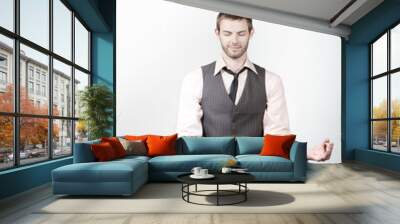 handsome young businessman meditating on desk Wall mural