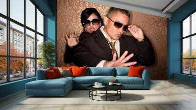 Hispanic couple caught in photographer flash Wall mural