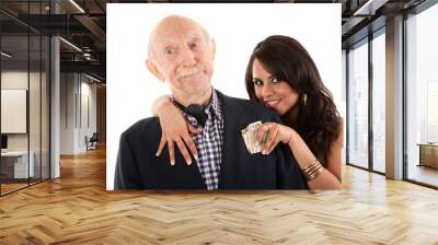 rich elderly man with gold-digger companion or wife Wall mural