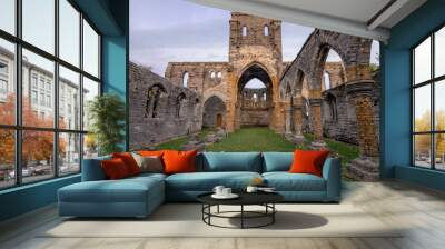 Dramatic archways and weathered grey stone ruins. The unfinished church in the town of St. George's, Bermuda.  Wall mural