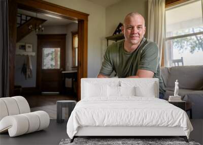 Marine veteran at home with family poses for portrait. Wall mural