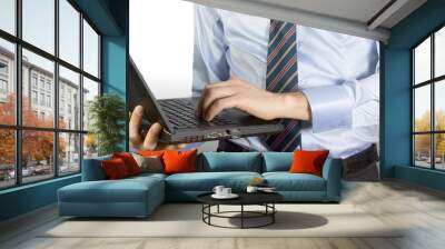 Businessman typing on a Personal Computer keyboard Wall mural