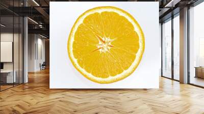 Flat lay, half slice orange Closeup with orange and yellow flesh, isolated white background. Wall mural