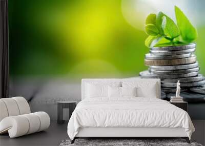 Green Investment Concept with Plant Growing on Coins Wall mural