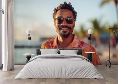 Happy african american man in vacation. Smiling face portrait of a black guy in the summer resort. Man in hawaiian shirt look at camera Wall mural