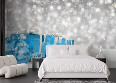 Blue christmas baubles and gifts lined up 3D rendering Wall mural