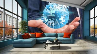 Businessman holding flying puzzle sphere ‘3D rendering’ Wall mural