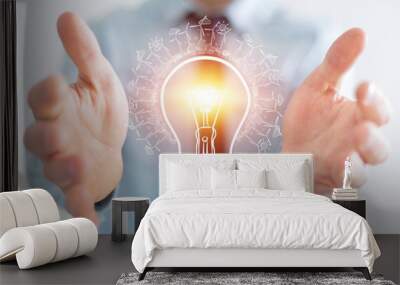 businessman holding renewable eco lightbulb sketch Wall mural