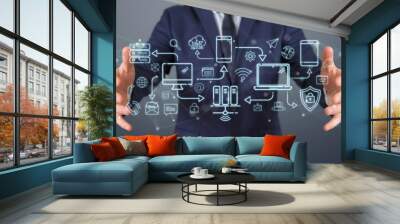 Businessman using tech devices and icons thin line interface Wall mural