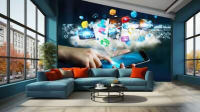 Businesswoman connected tech devices and icons applications with Wall mural