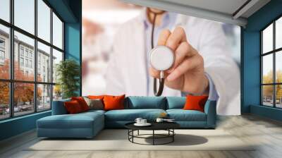 Doctor using stethoscope in hospital Wall mural