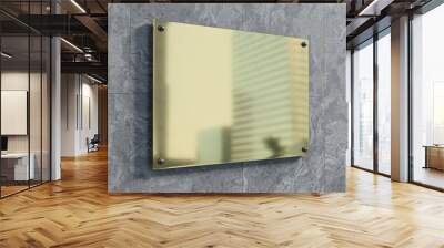 Golden sign plate on wall mockup. Template of a gold business signboard on marble texture. 3D rendering Wall mural