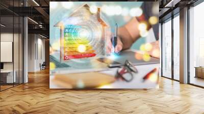 Graphic designer using 3D rendering energy rating chart in a wooden house Wall mural