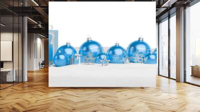 Isolated glossy christmas decoration lined up on white. 3D rendering blue shiny baubles ornaments. Gifts with bows and glossy golden stars. Merry Xmas cut out background Wall mural