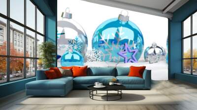 Isolated glossy christmas decoration lined up on white. 3D rendering blue shiny baubles ornaments. Merry Xmas cut out background Wall mural