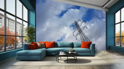 electricity pylons cords  blue sky clouds Wall mural