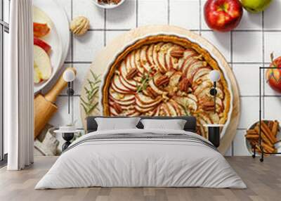 Apple pie. Apple tart with cinnamon, walnuts and pecan nuts, top view Wall mural