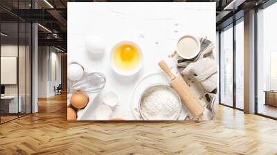 Baking homemade bread on white kitchen worktop with ingredients for cooking, culinary background, copy space, overhead view Wall mural