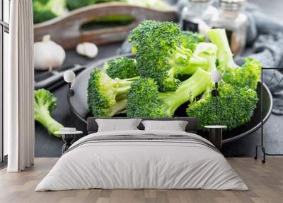 Fresh raw broccoli on board Wall mural