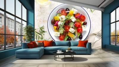 Greek salad. Vegetable salad with feta cheese, tomato, olives, cucumber, red onion and olive oil. Healthy vegetarian mediterranean diet food. Top view Wall mural