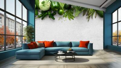 Green vegetables. Fresh green produce. Healthy vegetarian food concept background. Flat lay. Top down view Wall mural