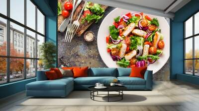 Healthy vegetable salad with grilled chicken breast, fresh lettuce, cherry tomatoes, red onion and pepper Wall mural