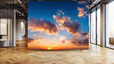 beautiful evening blue sky at sunset with flaming bright light clouds a warm summer evening at sunset Wall mural