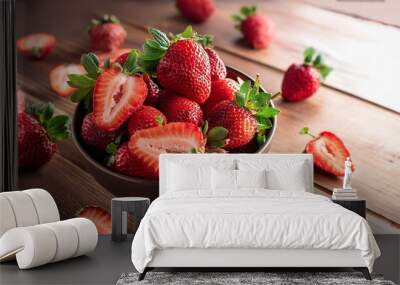 fresh strawberries in a bowl decorated by cut strawberry on rustic wooden table Wall mural