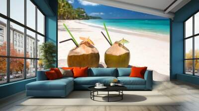 two coconut drinks on tropical beach resort Wall mural