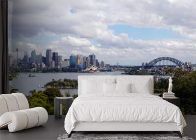 Distant view of modern buildings and the opera house overlooking the Harbour in Sydney CBD, New South Wales, Australia Wall mural