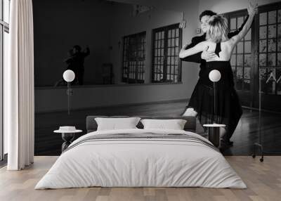 two ballroom dancers practicing in their studio Wall mural