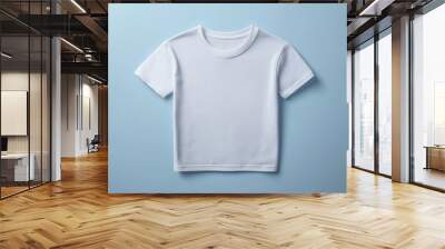 White t shirt mockup lying on blue background Wall mural