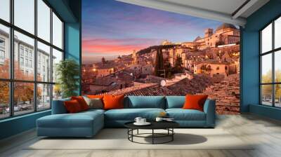 Assisi, Italy rooftop hilltop old town skyline at dusk. Wall mural