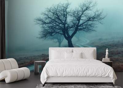 A foggy morning with bare trees, creating a mystical and eerie autumn atmosphere perfect for Halloween. Concept of landscape. Wall mural