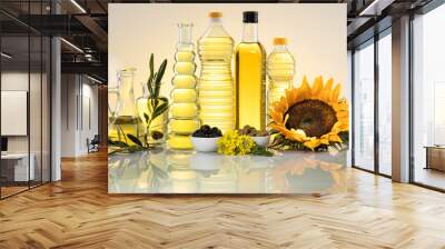 Healthy oil from sunflower, olive, rapeseed oil. Cooking oils in bottle Wall mural