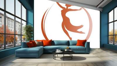 Dynamic silhouette of a graceful woman dancing in an elegant pose. Wall mural