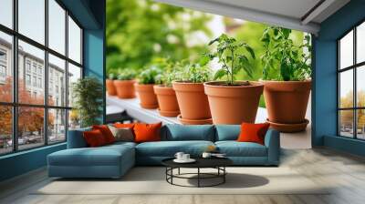 A row of potted plants on a balcony, showcasing greenery and growth. Wall mural