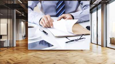 Businessman working in office Wall mural