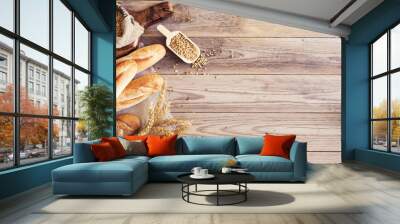 Freshly baked bread on wooden table Wall mural