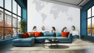 Group of people sitting on chairs Wall mural