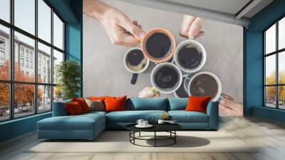 People hands holding cups of coffee Wall mural