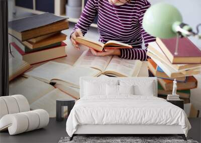 Student studying on the table Wall mural