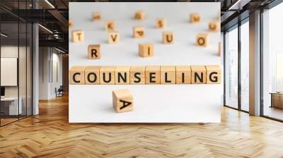 Counseling - word from wooden blocks with letters, psychological talking therapies concept, random letters around, white  background Wall mural